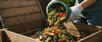 A sleek, stainless steel 100 kg fully automatic composting machine installed in a modern UAE commercial kitchen.